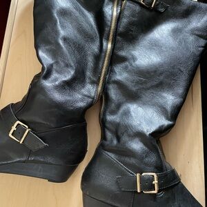 Used Jessica Simpson size 8 knee high black boots with minimal wear.